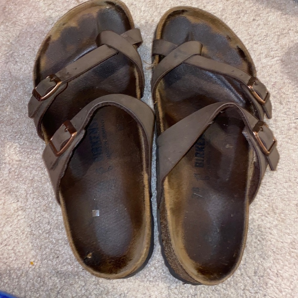 Brown cross strap birkenstocks